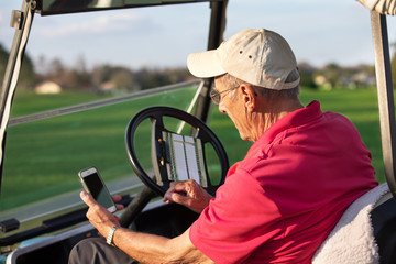 Senior man golfing