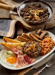 Hearty Scottish breakfast with haggis