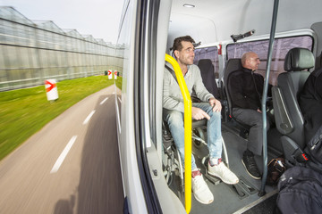 Disabled passenger in a taxi bus