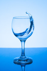 a glass of water on white background.