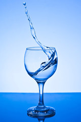 a glass of water on white background.