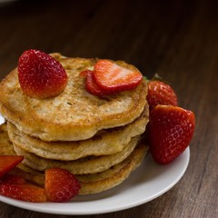 Stack of homemade wholegrain buckwheat pancakes. Individually fried on pan, thus imperfect shape - obrazy, fototapety, plakaty