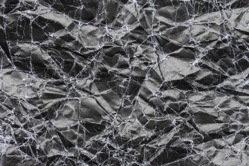 abstract black wrinkled paper texture background