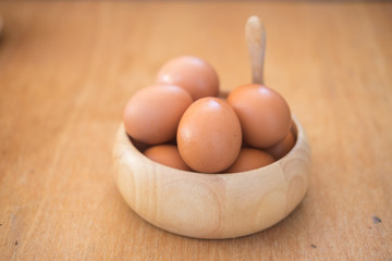 Eggs in a wooden bowl