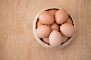 Egg chicken egg in wood bowl