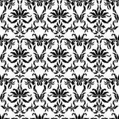Damask seamless pattern. Ornate floral design in royal  baroque style on a white background. Ideal for textile print and wallpapers.
