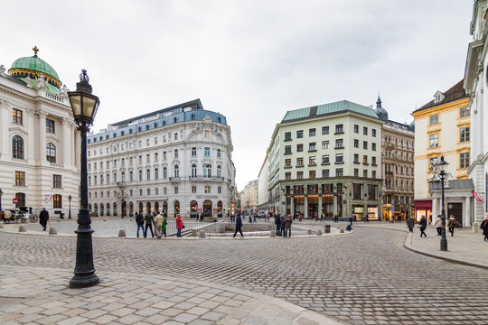 Cloudy view of Hofburg Palace at Michaelerplatz, Habsburg Empire landmark in Vienna, Austria.