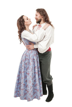 Beautiful couple woman and man in medieval clothes isolated