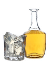 Whiskey and ice in glass on white background