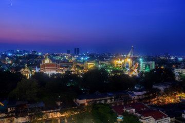 Cityscape view of bangkok under pink and blue sky.