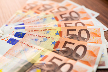 Fifty euro banknotes on the desk