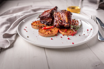 Hot Meat Dishes. Pork ribs grilled with peppers and apples