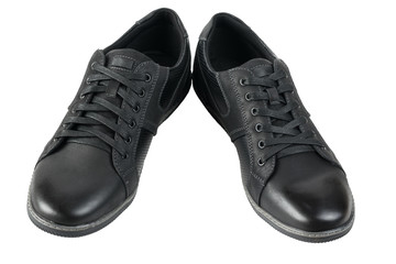Pair of athletic black mens shoes isolated on white background.