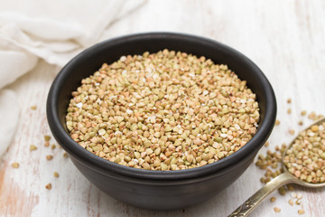 green buckwheat in black bowl
