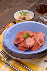 red radicchio ravioli with mushroom cream