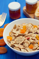 cereals with dry fruits in bowl and jam