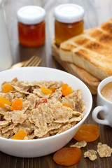 cereals with dry fruits in bowl and jam