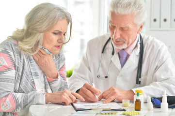 Sick elderly woman in a doctor's office