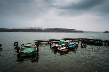 Boats on the lake pier