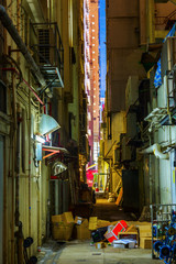 backstreet in Kowloon, Hong Kong, at night