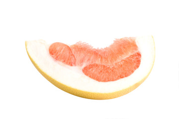 Fruit pomelo lies on a white background.Juicy red pulp