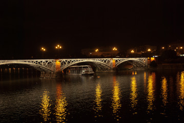 Fototapeta na wymiar Triana bridge in summer,Seville,Spain