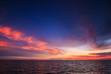 Fototapeta na wymiar Sunset with the sea. The romance time for honeymoon trip