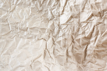 An abstract texture of rumpled packaging paper.