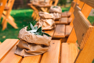 Outdoor wedding ceremony decoration with greenery