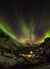Aurora borealis (Polar lights) over the mountains in the North of Europe - Senja island, Troms county, Norway - 142498012