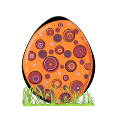 Decorated Easter egg with grass isolated on white background