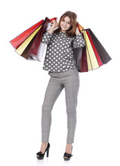 Young brunette woman with some shopping bags