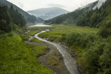 Mountain river in rainy day