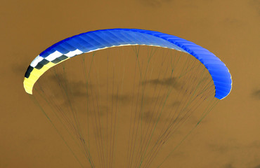 Parachute in the sky. Inversion