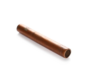 Rusty old copper pipe for heating, isolated on white background