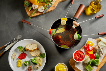 Eating a tasty fresh vegetable fondue