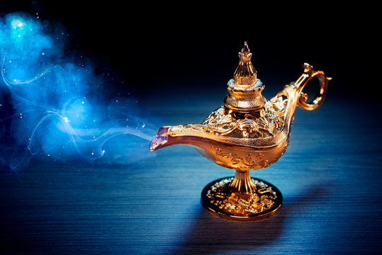 Magic Aladdin / Genie lamp with smoke on a dark background Stock-Foto |  Adobe Stock