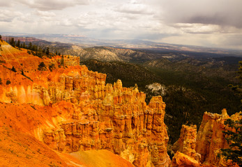 Bryce Canyon National Park, a sprawling reserve in southern Utah, is known for crimson-colored hoodoos, which are spire-shaped rock formations.