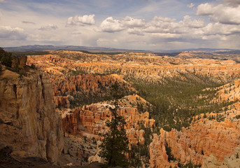 Bryce Canyon National Park, a sprawling reserve in southern Utah, is known for crimson-colored hoodoos, which are spire-shaped rock formations.