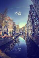 Naklejka premium Traditional old buildings in Amsterdam