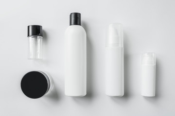 realistic blank tubes for cosmetics. Set with cosmetic vial, flask. Tube of cream.