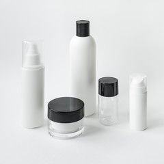 realistic blank tubes for cosmetics. Set with cosmetic vial, flask. Tube of cream.