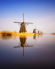 Sunset view at typical windmill at Kinderdijk, Holland. - 142508400