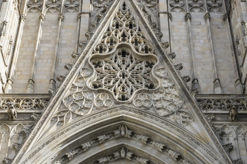 Fototapeta premium Tourism, Facade of the Cathedral of Barcelona located in the old part of the city, catalonia, spain