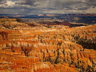 Bryce Canyon National Park, a sprawling reserve in southern Utah, is known for crimson-colored hoodoos, which are spire-shaped rock formations.