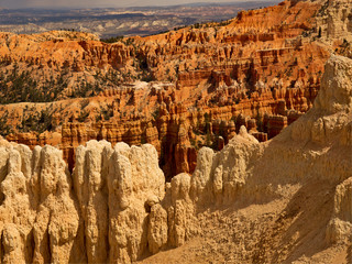 Bryce Canyon National Park, a sprawling reserve in southern Utah, is known for crimson-colored hoodoos, which are spire-shaped rock formations.