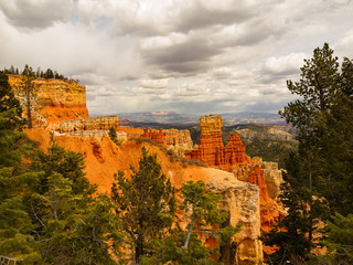 Bryce Canyon National Park, a sprawling reserve in southern Utah, is known for crimson-colored hoodoos, which are spire-shaped rock formations.