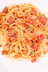 Spaghetti bolognese on a white background