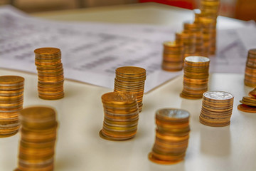 pile of coins and counting