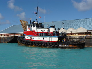 Naklejka premium Red and White Tugboat